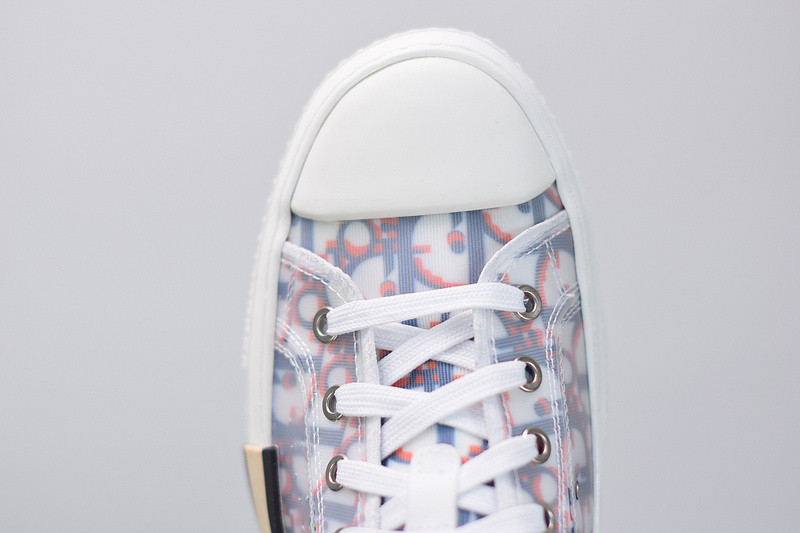 dio* b23 low-top sneaker in blue & red oblique